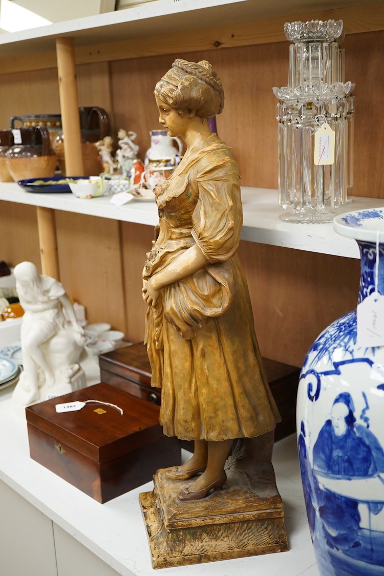 A French pottery figure of a lady, ‘La Cruche Cassée’, manufactured by Van Hasselt & Cie, 73cm